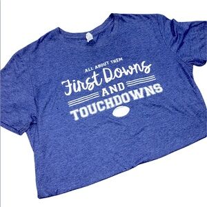 All about them first downs and touchdowns football graphic T-shirt; size medium